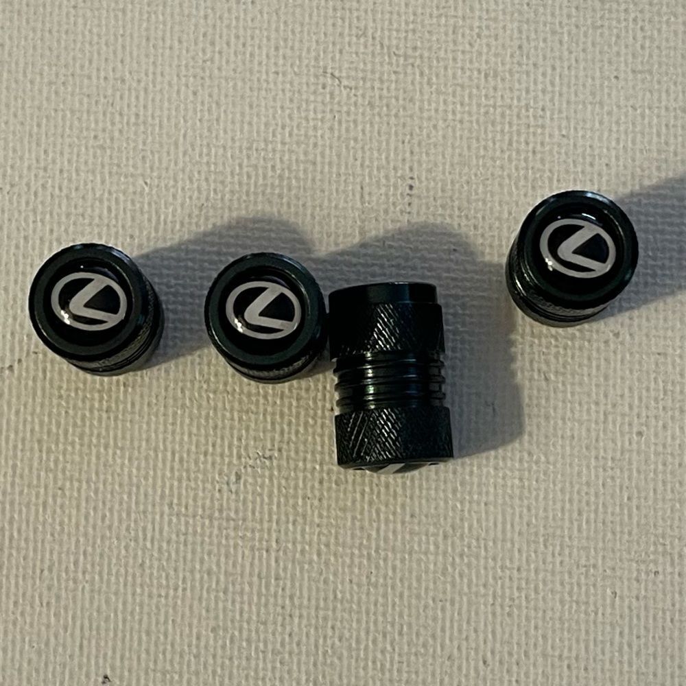 Lexus logo valve Stem caps in Black set of 4. NWT